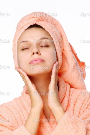 Young woman with closed eyes get a pleasure after bath - Stock Image