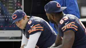 Chicago Bears quarterback Jay Cutler (6) sits on the bench with tight ...