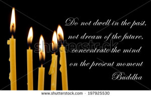 Buddha quote on black background with candles - stock photo