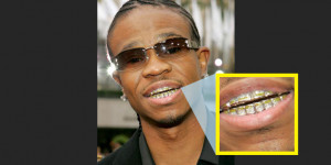 Chamillionaire pairs his Paul Wall-grill with a diamond tennis chain.