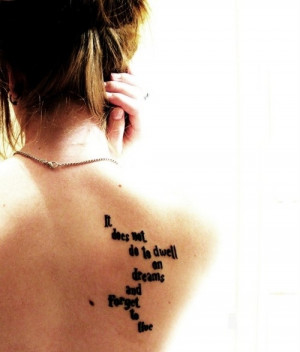 ... to dwell on dreams and forget to live quote tattoo on side back body