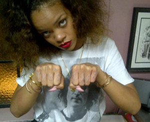 ... Dumbest Finger Tattoos – Rihanna vs. Walmart Guy [Photos, Poll