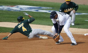 Detroit Tigers third baseman Miguel Cabrera bobbles the throw from ...