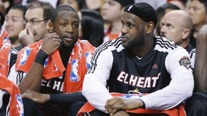... /Lynne Sladky What are Dwyane Wade and LeBron James discussing