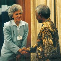 Colleen Lowe Morna shakes hands with Nelson Mandela after handing over ...