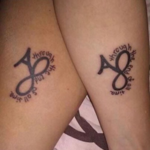 ... initials, the infinity symbol, and a quote from our first dance song