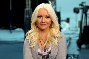 Singer Christina Aguilera is using her golden voice for good in the ...