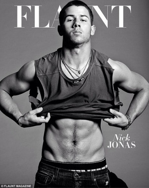 Abs appeal: Nick Jonas pulled up his shirt and showed off his chiseled ...