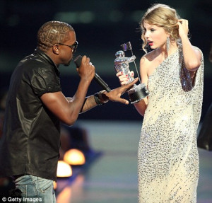 ... MTV stage and grabs microphone during Taylor Swift's acceptance speech