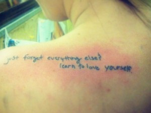 Jacqui Sandell's lyric tattoo on her shoulder