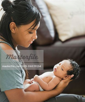 Mixed Race Mother Holding Baby