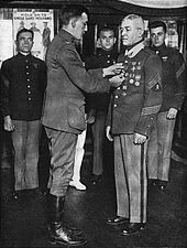 Daly being awarded the Médaille militaire .