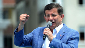 Turkish Prime Minister Ahmet Davutoglu speaks during a campaign rally ...