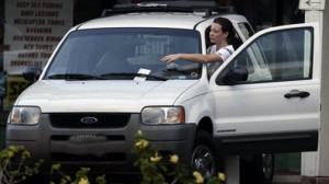 Evangeline Lilly drives Ford Escape.