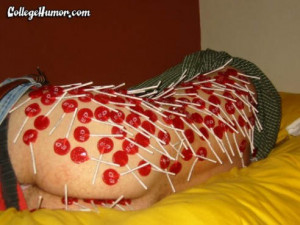 ... out drunk and unconscious party guest has lollipops stuck to his body