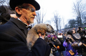 file photo, Groundhog Club handler Ron Ploucha holds Punxsutawney Phil ...