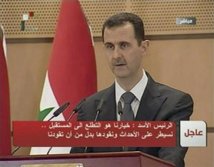 Syria's President Bashar al-Assad speaks in Damascus in this still ...
