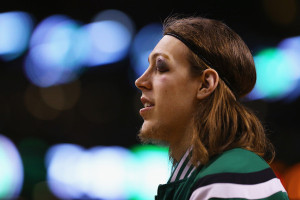 Kelly Olynyk Kelly Olynyk 41 of the Boston Celtics looks on before