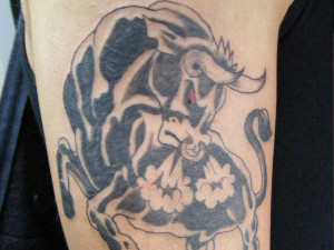 Angry Jumping Bull Taurus Tattoo On Biceps