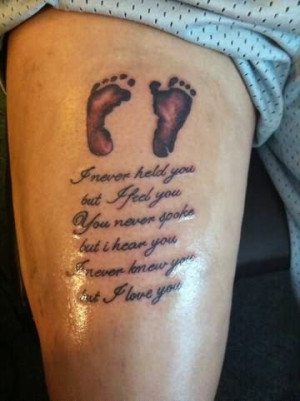 Foot Prints Tattoo On Bicep