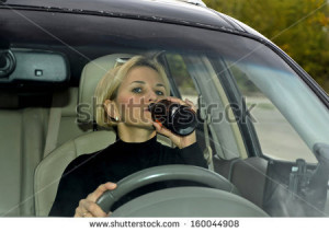 Drinking Alcohol While Driving Blonde woman drinking alcohol