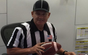 Les Miles dressed up as an official on Friday. (Twitter)