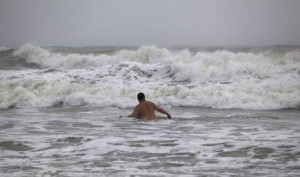 ... heavy surf of Hurricane Arthur, in Ocean Isle Beach, North Carolina