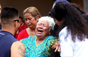 luisa seau mother of junior seau is consoled with friends and family ...