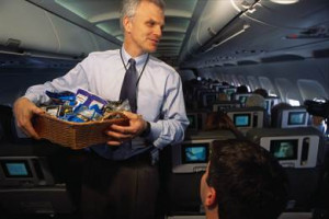 Image: JetBlue CEO David Neeleman handing out snacks
