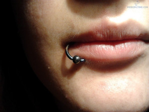 lower lip piercing with ball closure piercing jpg