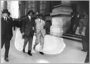 Upton Sinclair wearing a white suit and black armband, picketing the ...