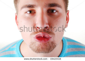 Portrait Young Funny Man With Kissy Lips Stock Photo