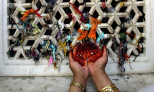 Kashmiri Muslim devotee prays in the shrine of Sufi saint Syed Abdul ...