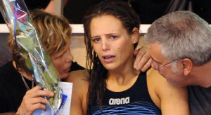 ... by her parents after being defeated in the final of the 400m freestyle