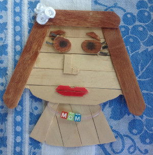 The popsicle stick rendering of Mom, made by my youngest, Lilly