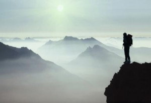 climber surveys the Mont Blanc region in Europe. - Photograph ...