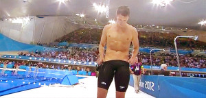 An USA swimmer tore off his official speedo swimwear after racing.