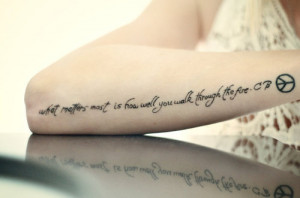 Awesome Black Ink Quote Tattoo On Right Arm
