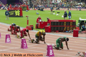 Usain Bolt And Other Athletes Await The Start Of The 200m At London ...