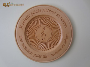 The second plate bears a quote by Robert Fripp “Music is wine that ...