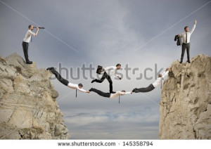 Teamwork and success concept with a bridge of businessperson - stock ...