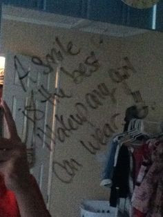 Writing inspirational quotes on my bedroom mirror. :) More