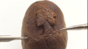 Thread: Micro-portrait of the Queen carved onto a coffee bean - BBC