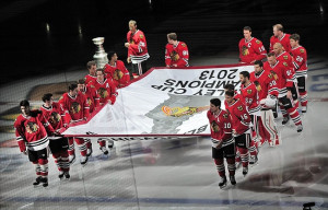 Oct 1, 2013; Chicago, IL, USA; Members of the Chicago Blackhawks skate ...