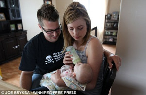 Family: David Weber, 32, with his wife, Genevieve, and the couple's ...
