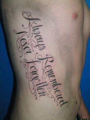 quote tattoos on rib cage for girls. tattoo quotes for girls on