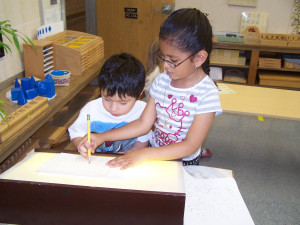 ... the GW Elementary School Montessori Program: Children Working Together