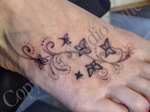 foot and ankle tattoos are closely situated near each other so these ...