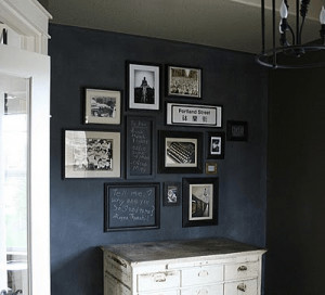 chalkboard wall with quotes and frames in a gallery in dining room