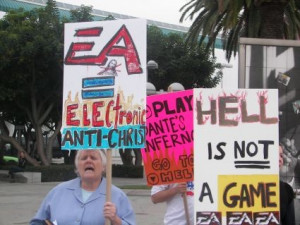 ... : Protesters go after EA's Dante's Inferno outside convention center